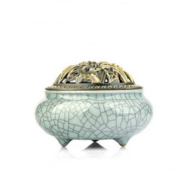 Longquan celadon ; Geyao power blue & iron wire tripod burner with copper imitation and peony shape design lid